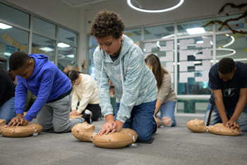 Community Group learning Hands-Only CPR