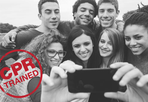 students posing together for selfie black & white