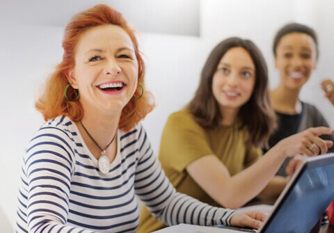 women at table working