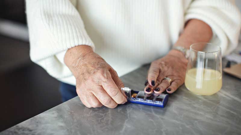 hands on pill organizer