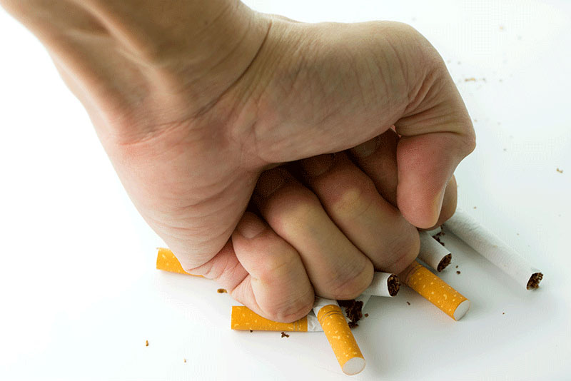 Quit Smoking Hand Smashing Cigarettes