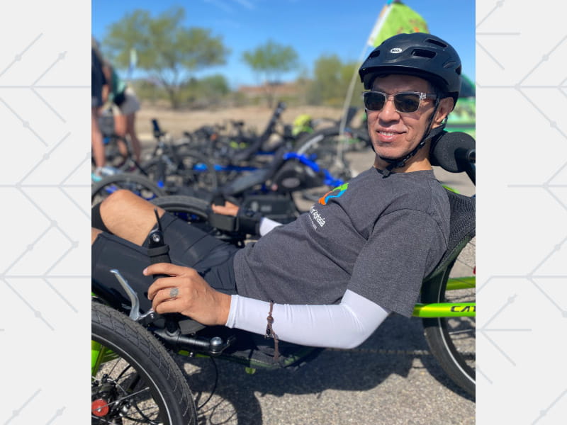 Stroke survivor Joe Granados on a recumbent trike in April. (Photo courtesy of Alba Patricia Granados)