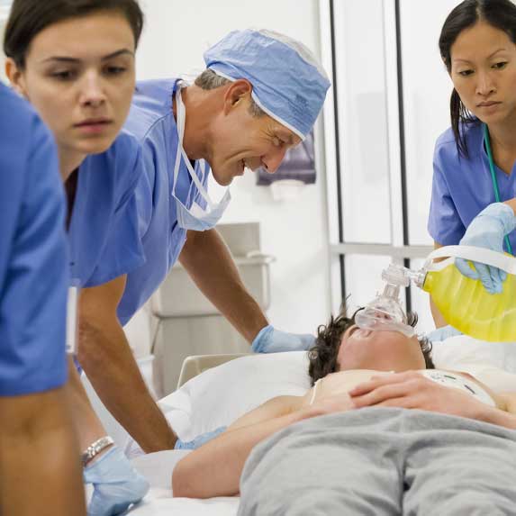 emergency doctor and nurses with patient