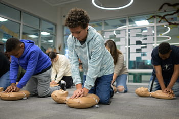 students learning CPR students learning CPR