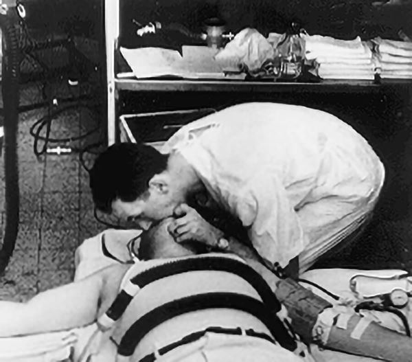 1956 Dr. Safar performing mouth-to-mouth breathing 1956 Dr. Safar performing mouth-to-mouth breathing