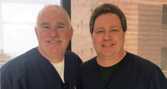 Nurse Michael Lovelace (left) with critical care nurse Ken Harris